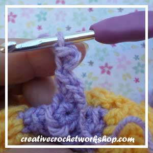 The Rapunzel Flower | Free Crochet Pattern | American Crochet @americancrochet.com @creativecrochetworkshop.com #freecrochetpattern