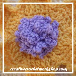 The Rapunzel Flower | Free Crochet Pattern | American Crochet @americancrochet.com @creativecrochetworkshop.com #freecrochetpattern
