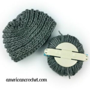 My Dolly Edgy Messy Bun Hat | Crochet Pattern | American Crochet @americancrochet.com #crochetpattern