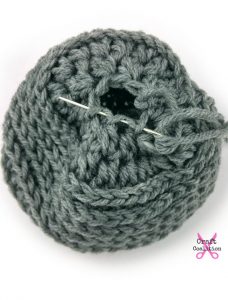 My Dolly Edgy Messy Bun Hat | Crochet Pattern | American Crochet @americancrochet.com #crochetpattern