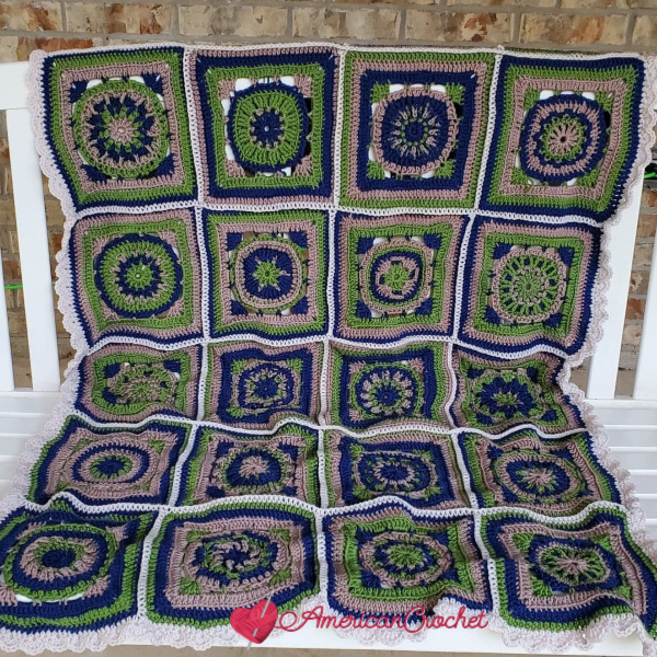 Riverwood Square Blanket layed across the swing on the porch