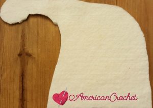 Santa Hat Hotpad | Crochet Pattern | American Crochet @americancrochet.com #crochetpattern