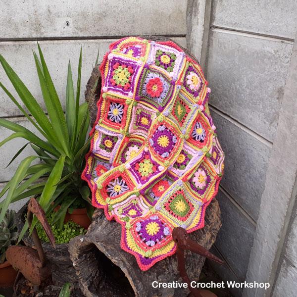 Groovy Mini Granny Square Baby Blanket Cal | @americancrochet.com @creativecrohcetworkshop.com #freecrochetpattern #freecrochetalong