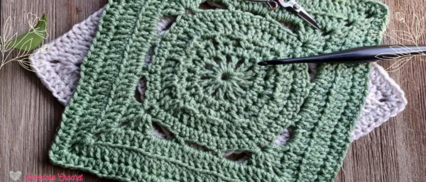 Showing the square, crochet hook and scissors