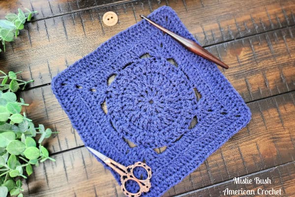 Bois D'Arc Square crochet pattern – a textured 9-inch crochet afghan block in deep blue, featuring Front and Back Post double crochet and back loop stitches. Part of the Riverwood Square CAL 2025