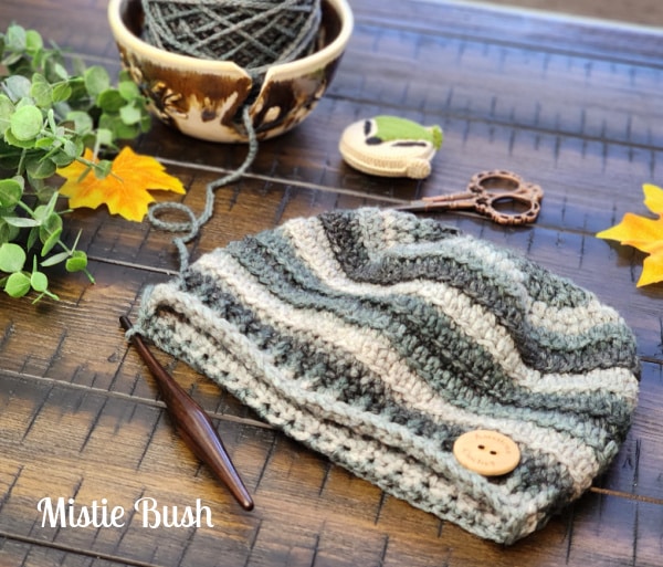 Multi shades of gray beanie laying on table
