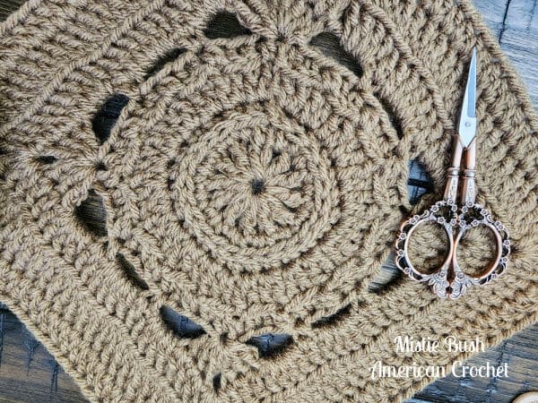 A detailed close-up of the Fairchild Square crochet pattern, showcasing the intricate texture created by 3rd loop stitches, back loop only stitches, and front loop only stitches. The raised and recessed stitches add depth, making this 9-inch square a standout piece in the Riverwood Square CAL 2025.