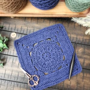 Fallbrook Square crochet pattern – a 9-inch textured crochet square featuring single, half double, double, and treble crochet with back loop only stitches. Part of the Riverwood Square CAL 2025 by American Crochet.