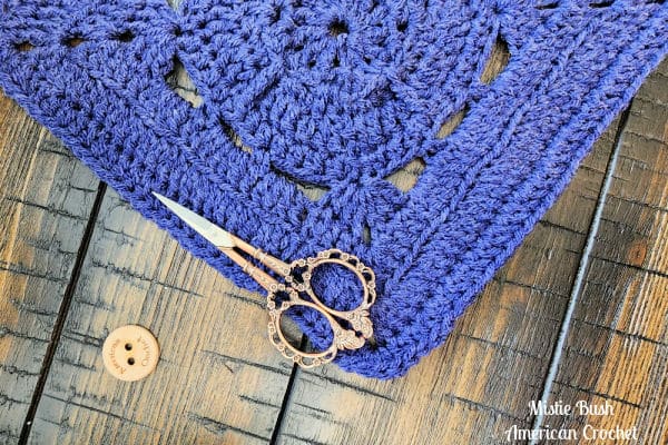 Close-up of Acquaintance Square crochet texture highlighting the height from treble crochet and the ridged details from back loop only rows.