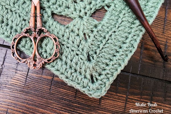 Close-up of the Stade Crossing Square stitches, highlighting the texture created by back loop and front post stitches for depth and visual structure.