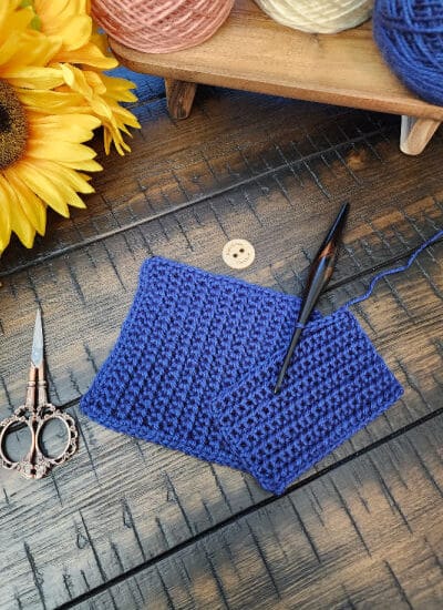 Flat lay of the Little Luminary Bonding Square crochet pattern in soft neutral yarn.